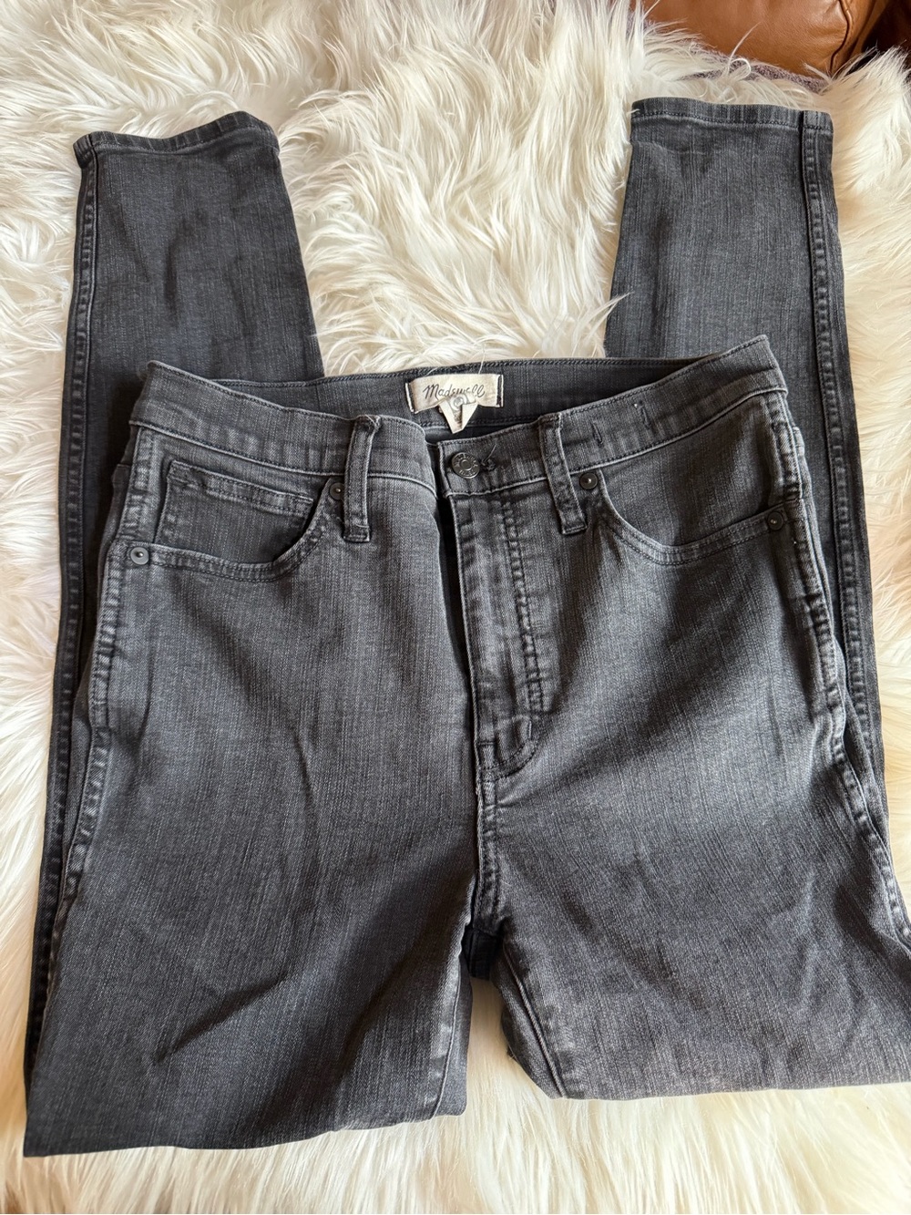 Madewell Skinny High-Rise Jeans in washed black color